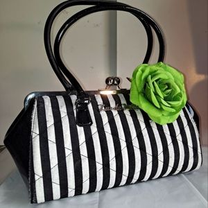 Lux De Ville black and white striped purse handbag. Green rise brooch